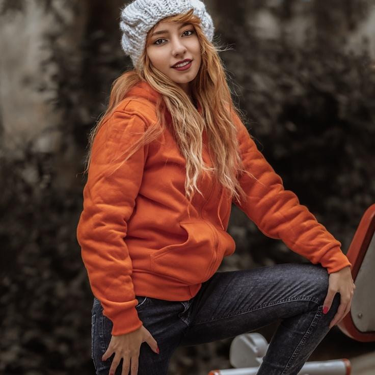 Kaveri Mehta, Lead Design Curator at Dynamic Growth Ecosystem, reviewing corporate floral arrangements